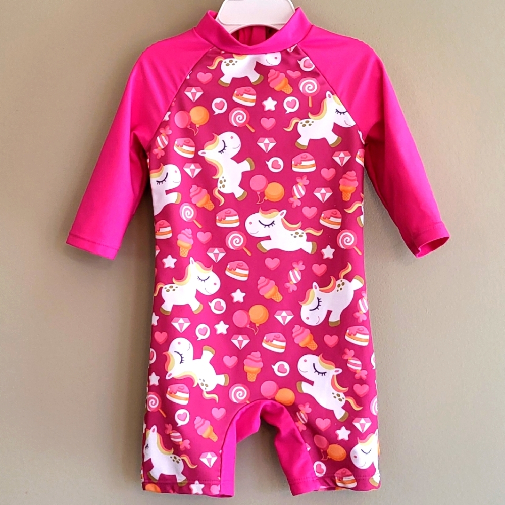 Adorable pink unicorn rashguard swimsuit